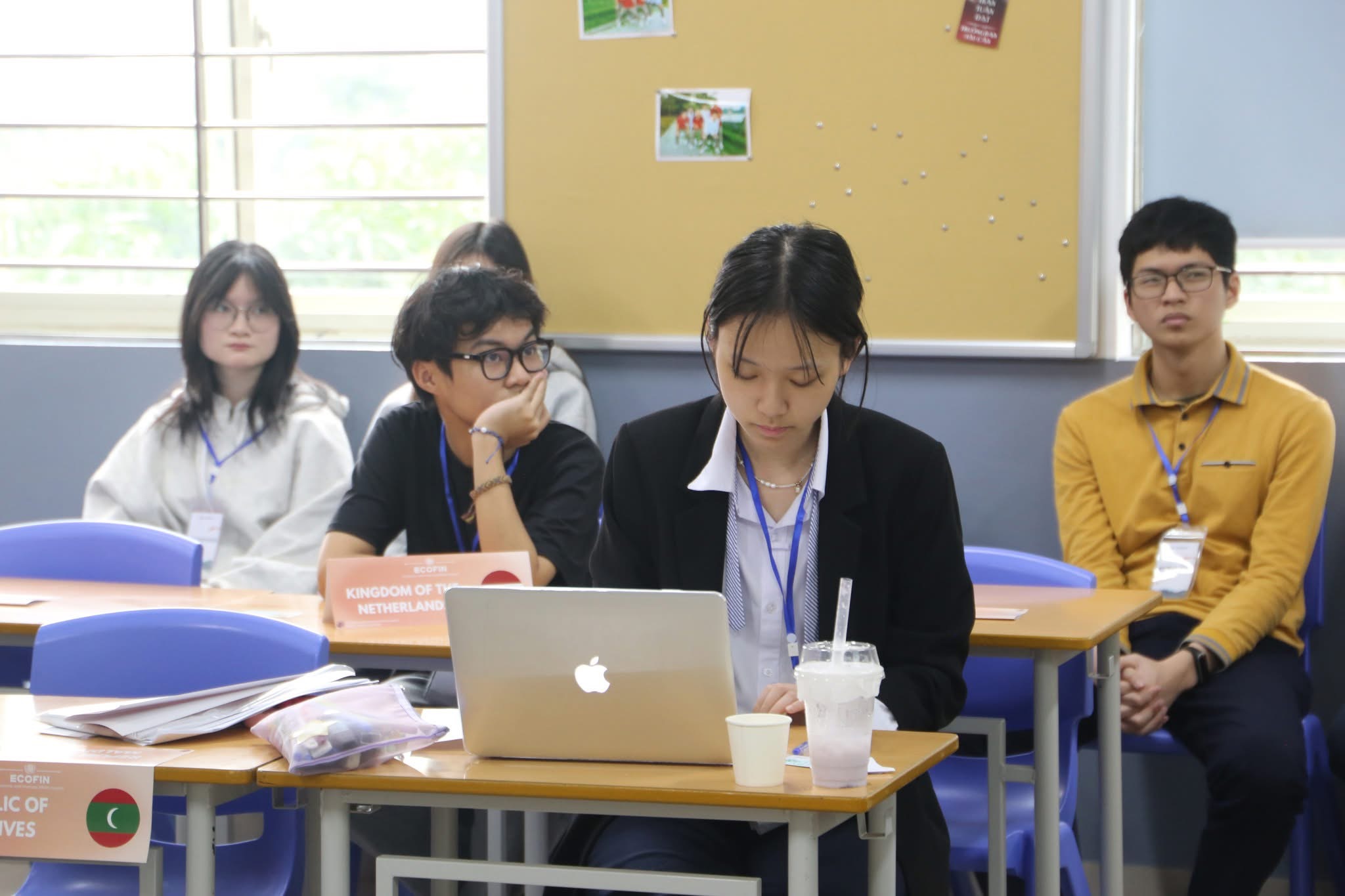 Delegates at their desks during a Model UN session