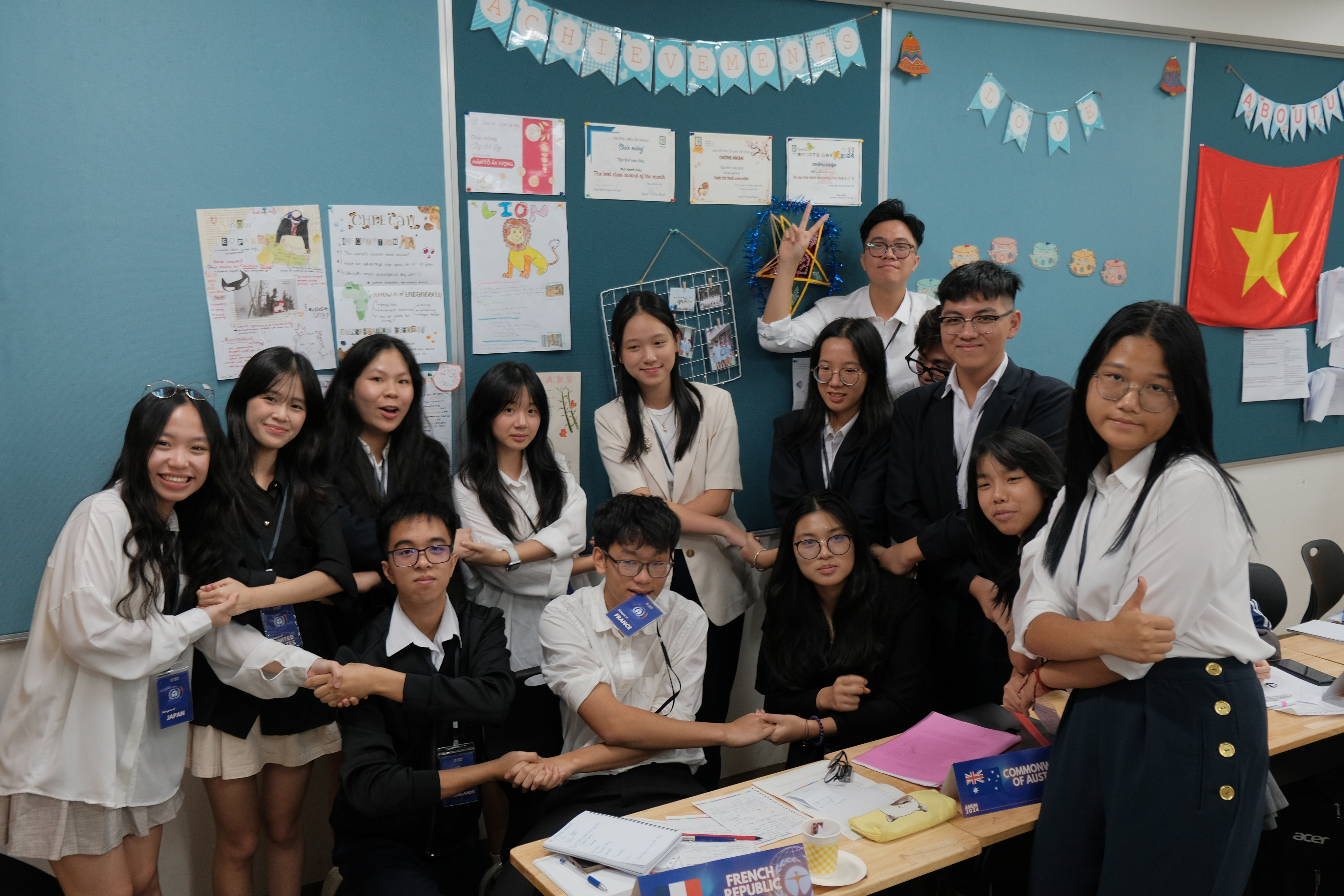 The whole committee squeezed into one classroom photo