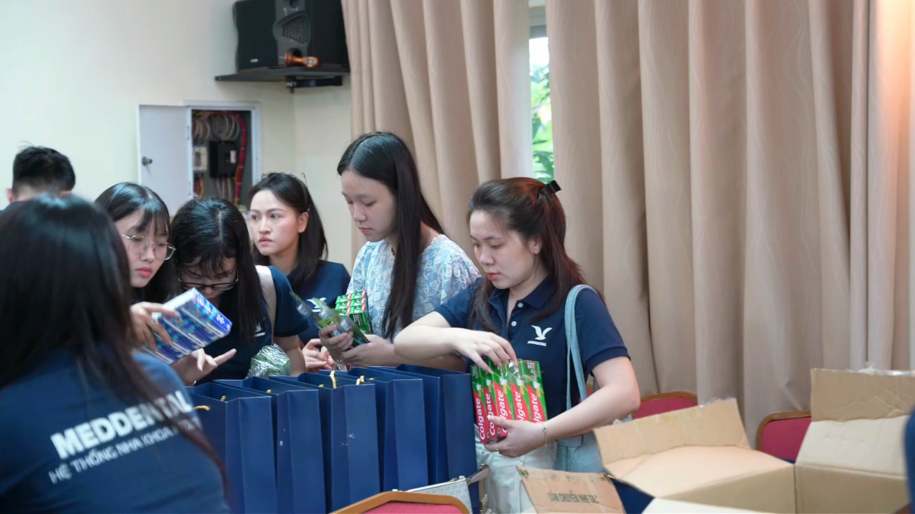 Gia Han and friends packing gift bags