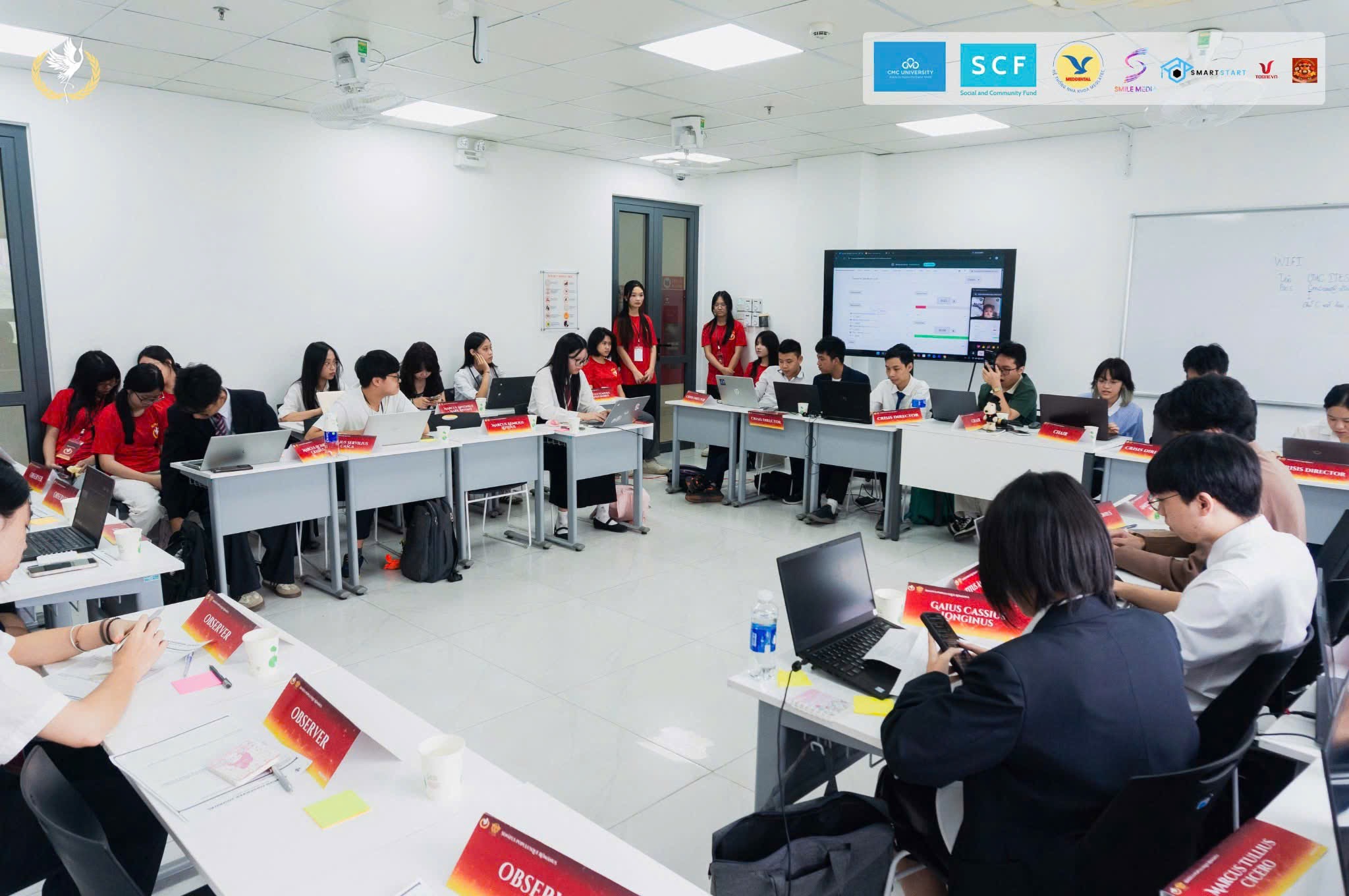 Delegates at work in a ROMUN committee room